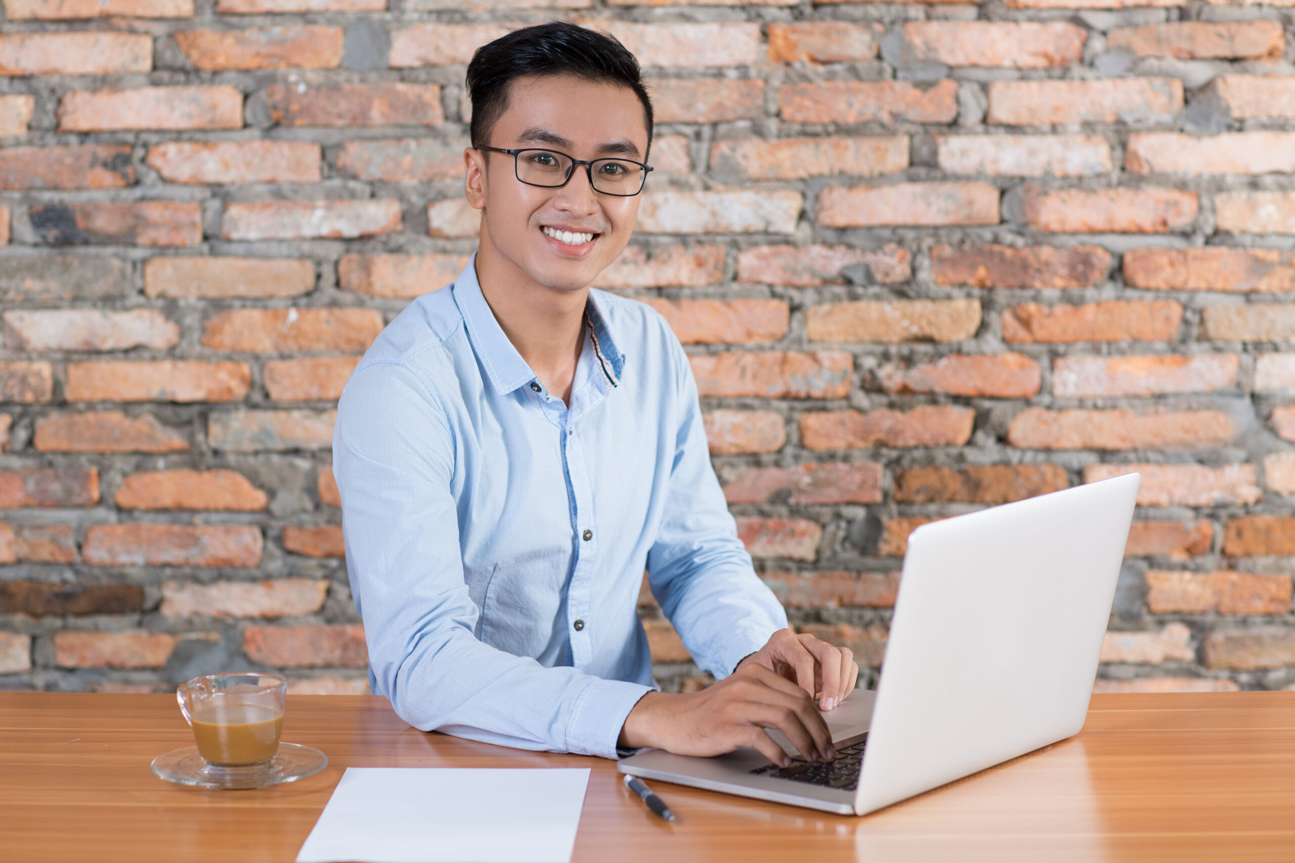 Business Man Having Idea and Working at Desk